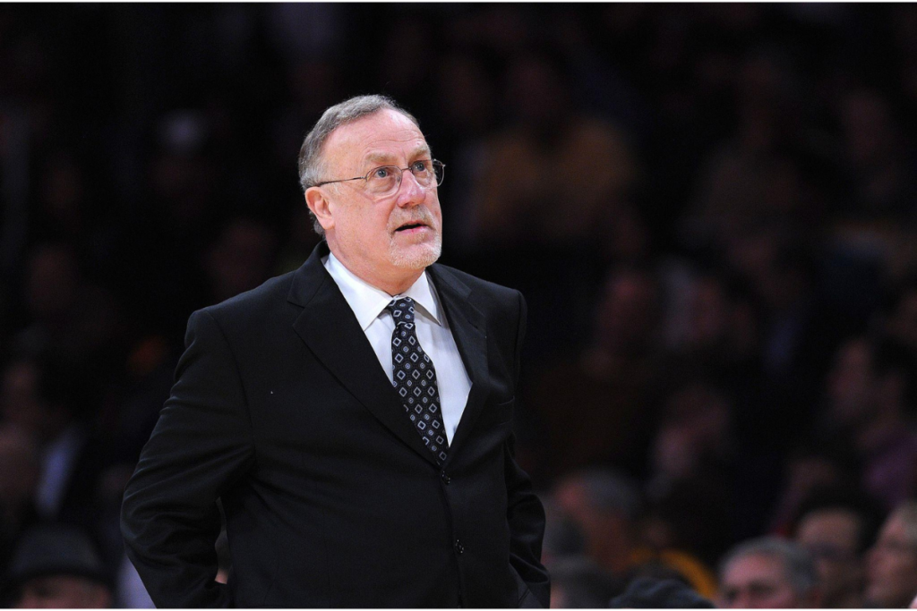 Rick Adelman coaching on NBA sidelines during game