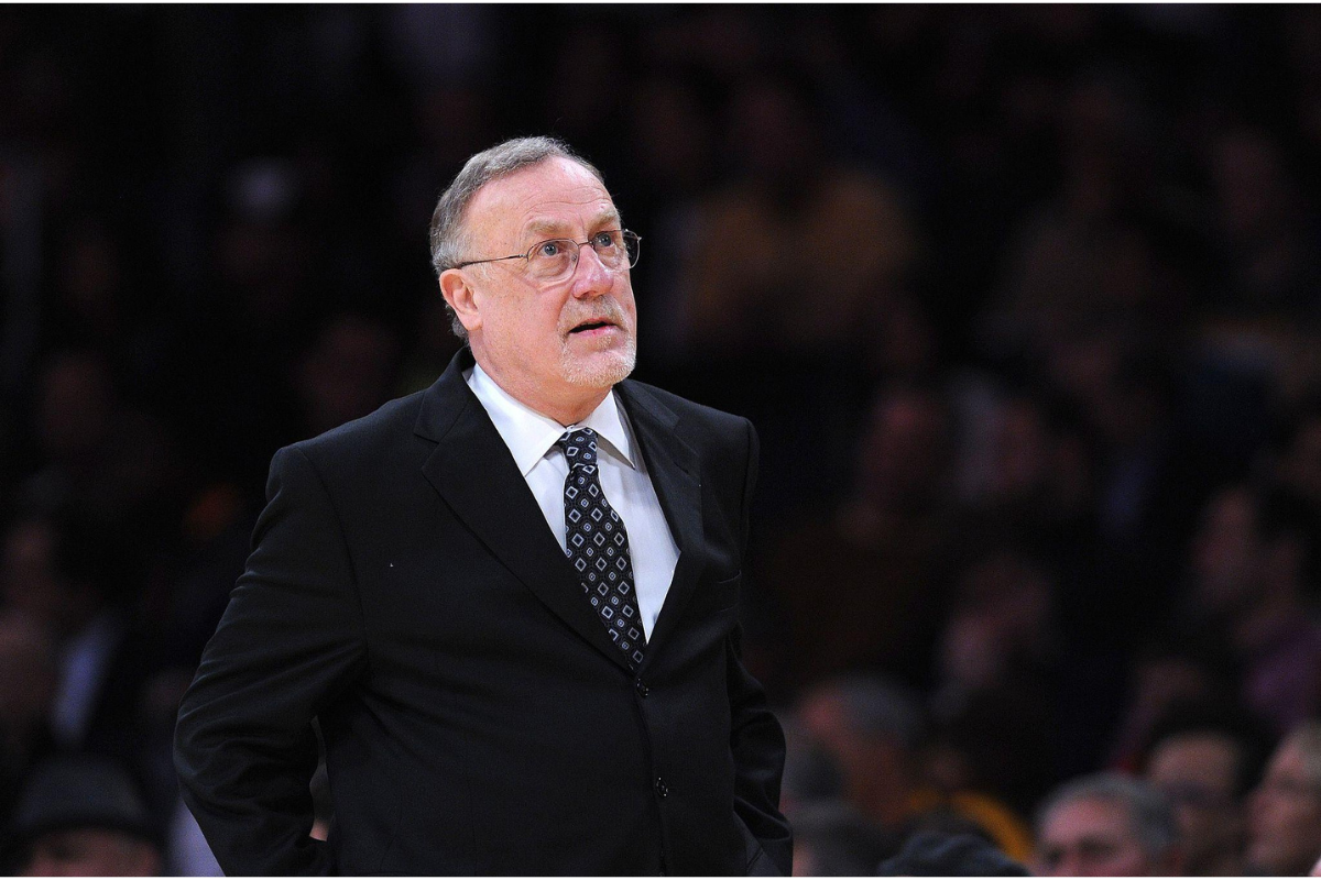 Rick Adelman coaching on NBA sidelines during game